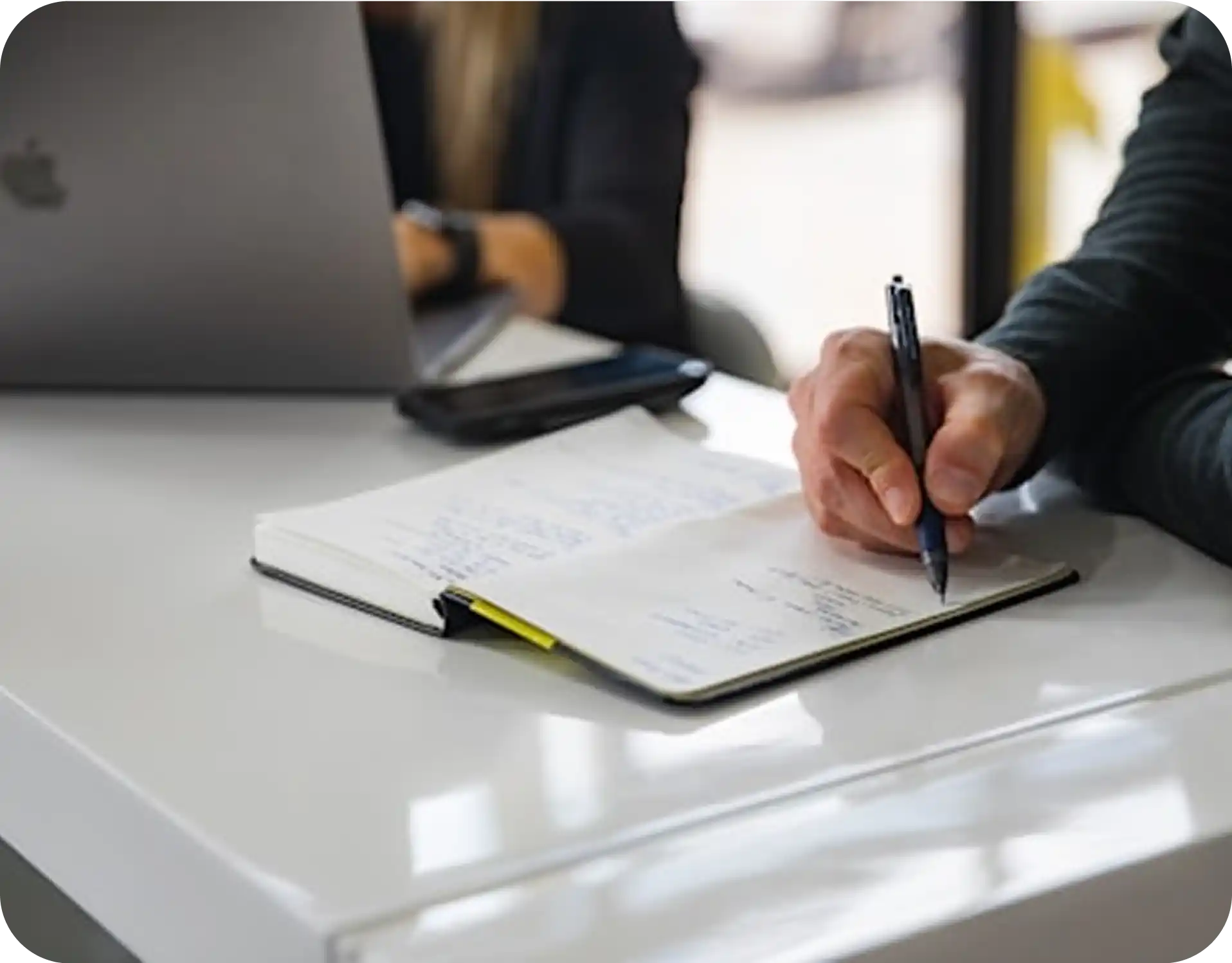 Person writing down land requirements